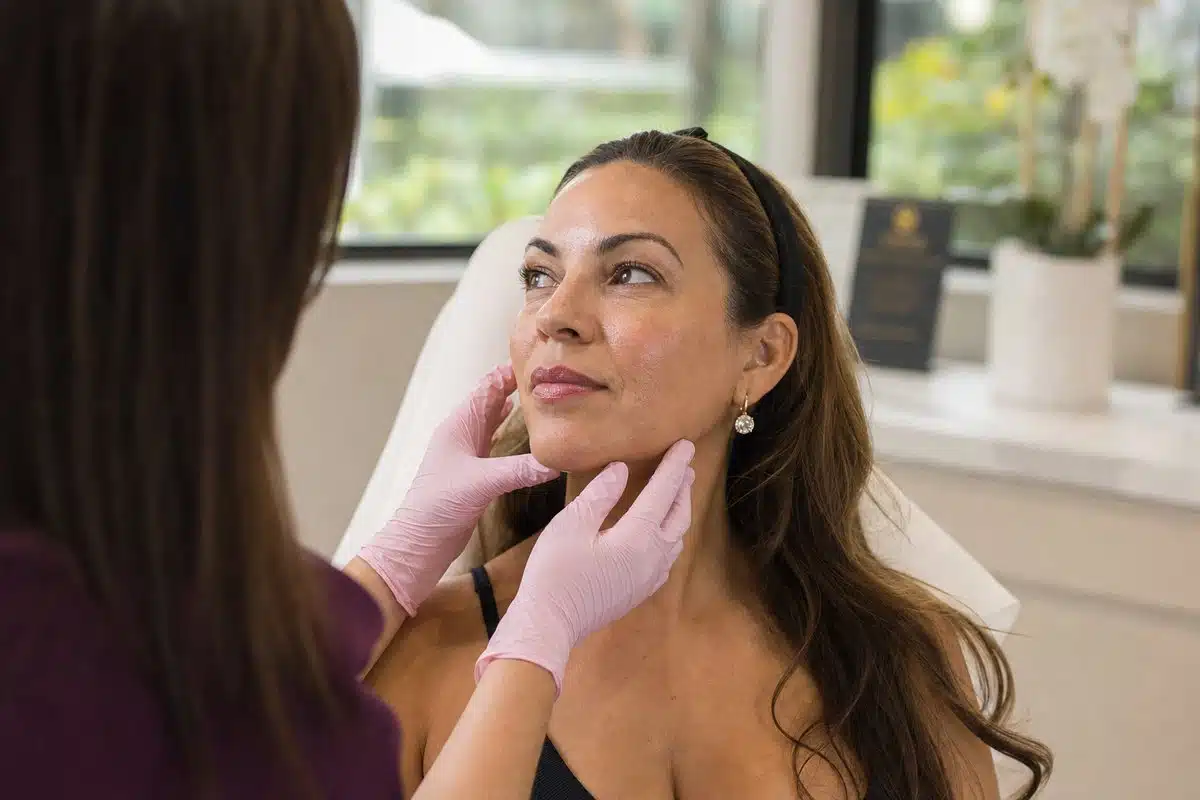 Close-up of Latina woman showing smooth glowing skin results after SkinPen microneedling in Miami Lakes