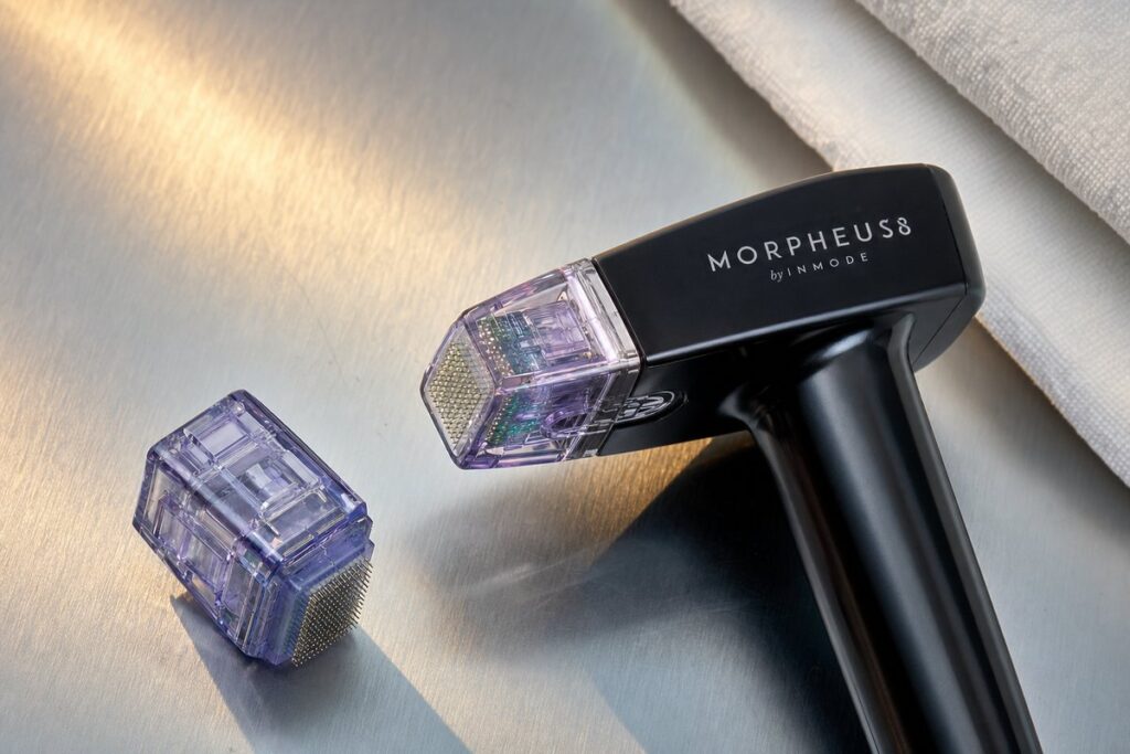 Morpheus8 InMode RF microneedling handpiece and tip on brushed steel counter at Miami Lakes Med Spa