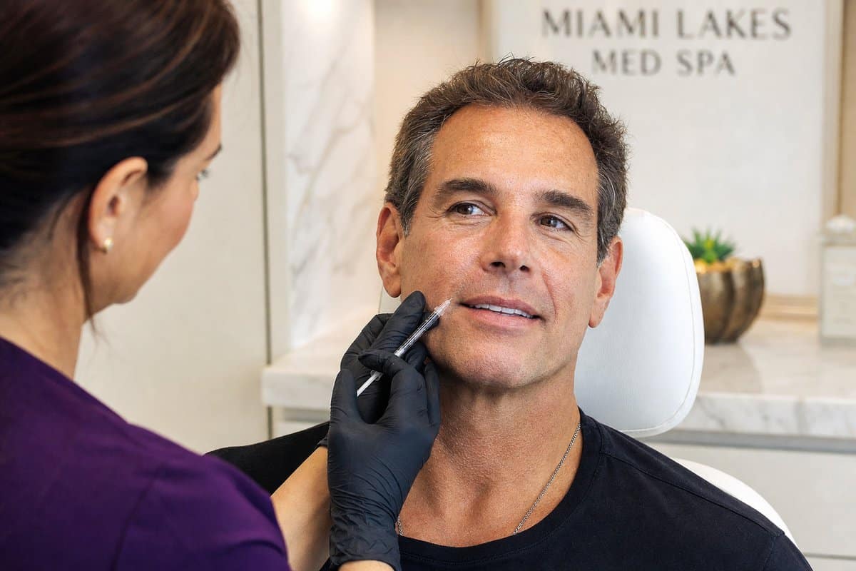 Close-up portrait of a man's refreshed upper lip showing natural results from Botox lip flip treatment
