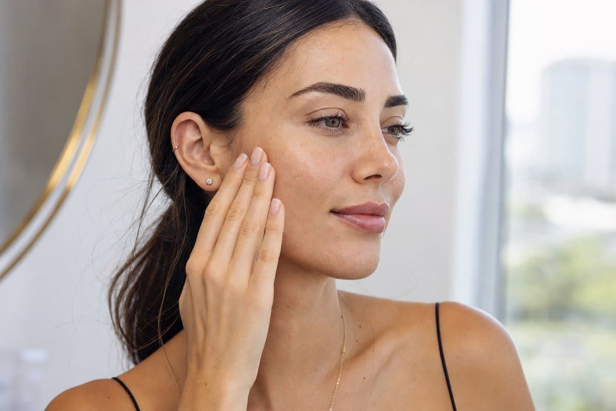 Close-up portrait of smooth cheek skin showing refined texture after Morpheus8 treatment in Miami Lakes